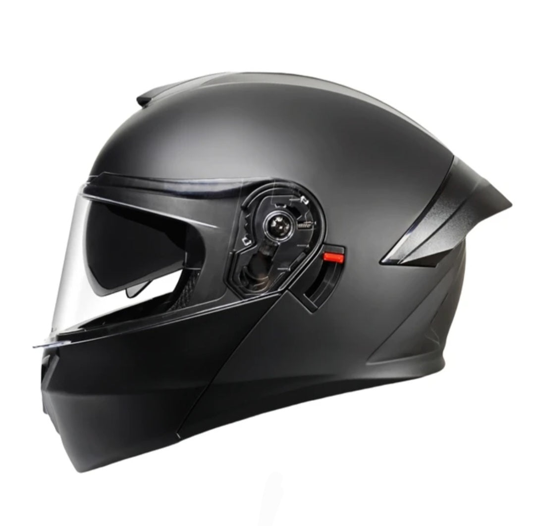 Black motorcycle helmet with black visor