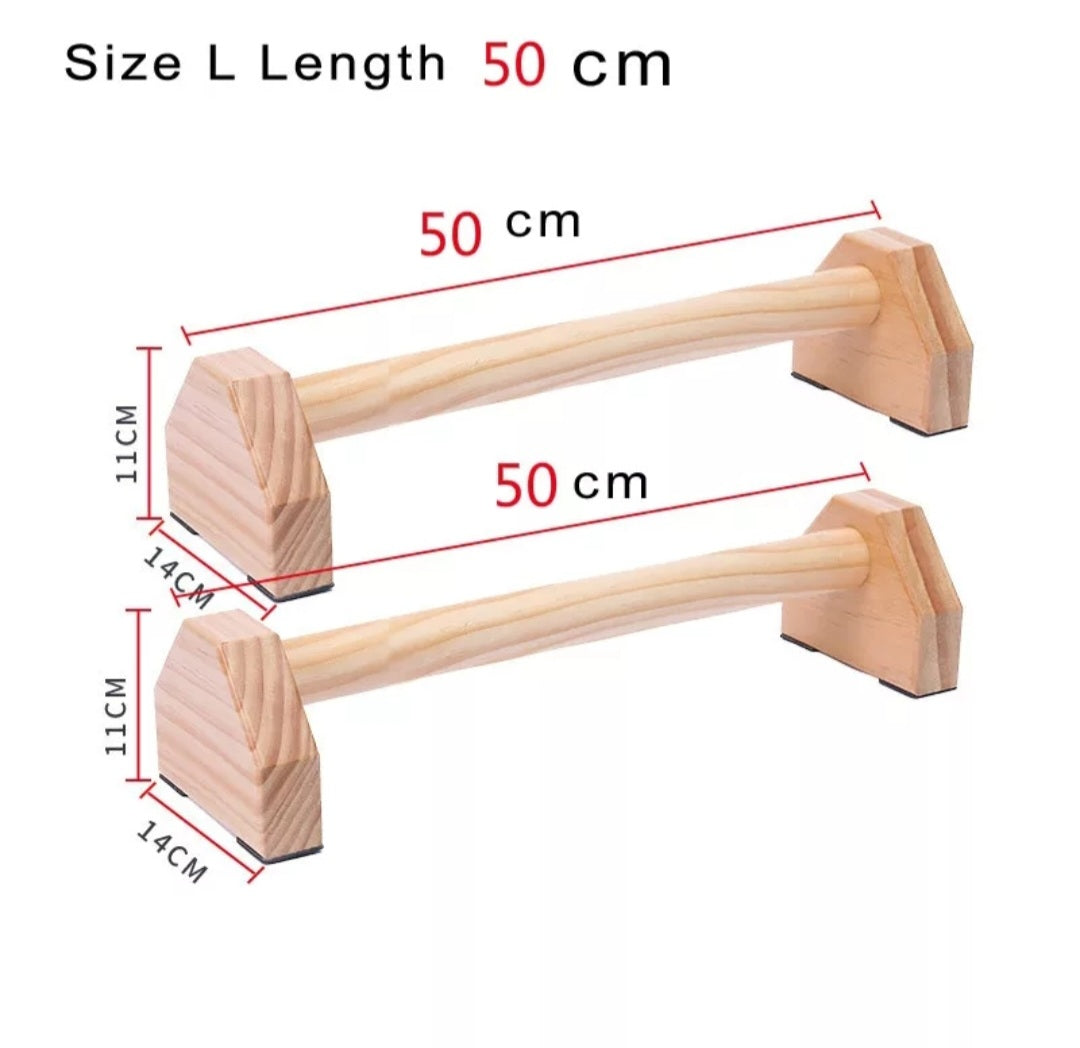 Wooden push up bars with measurements on a white background